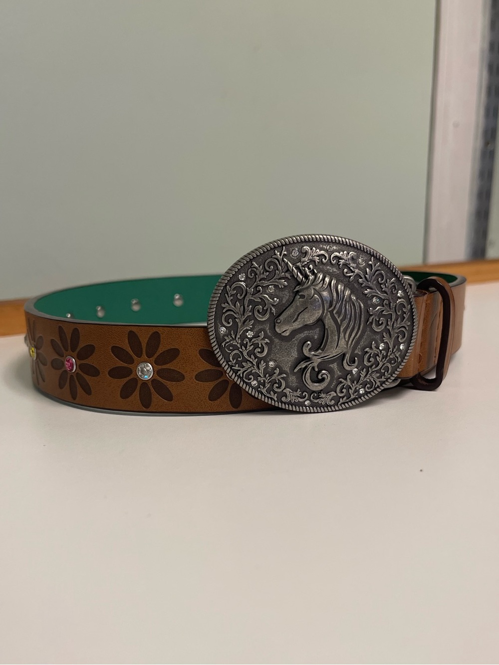 Girls' Brown Floral Belt with Turquoise Lining and Silver Horse Buckle
